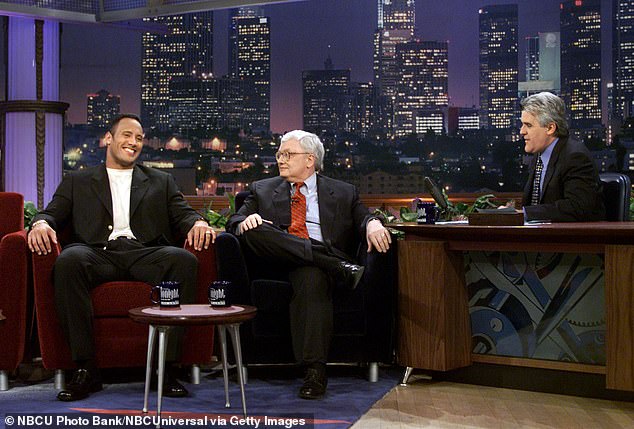 Johnson, seen with Roger Ebert (center) and Jay Leno in 2000, became even more famous after leaving the wrestling world