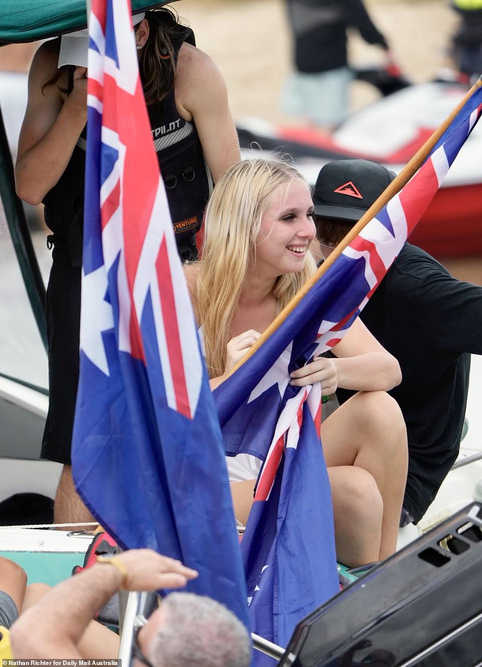 Thousands rushed to the beach this Australia Day as temperatures reached the high 40s in Sydney