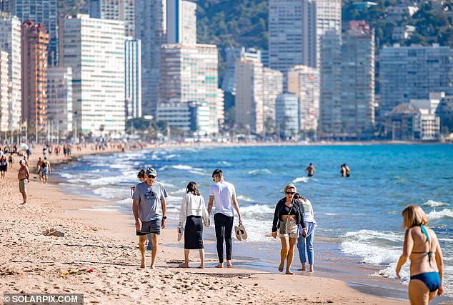 The scenes on the beach in Benidorm yesterday could have been mistaken for a summer day