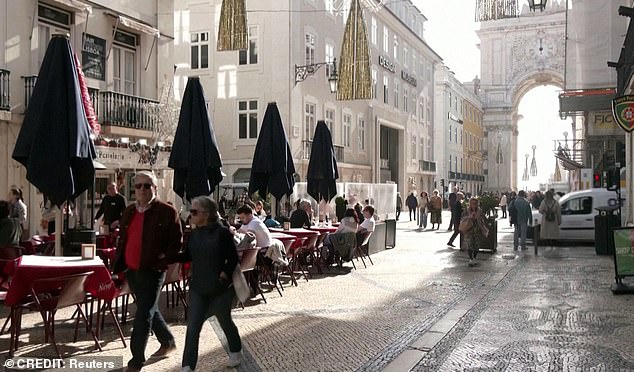 On Thursday, people sat on terraces to take full advantage of the high temperatures