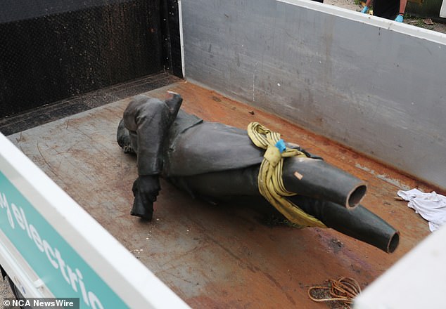 Captain Cook's statue in St Kilda was cut down by anti-Australia Day protesters this week and is shown here being loaded into a truck