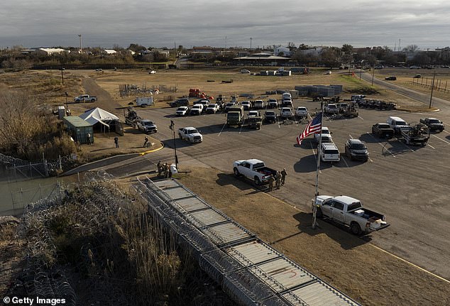 An aerial view shows the Texas National Guard staging area for military equipment and soldiers at Shelby Park on Jan. 26, 2024, in Eagle Pass