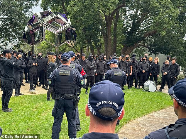 The group was later led away by police to St Peters Park (pictured) near North Sydney station, where officers read out a notice to leave for the group.