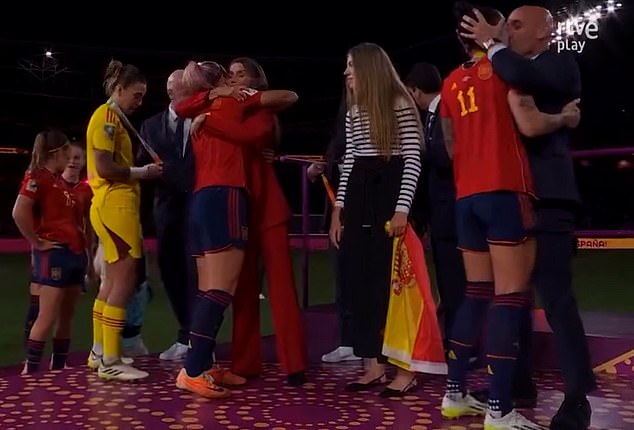 This is the moment when the male president of the Spanish FA Rubiales grabs one of La Roja's World Cup winning players Hermoso and kisses her on the mouth