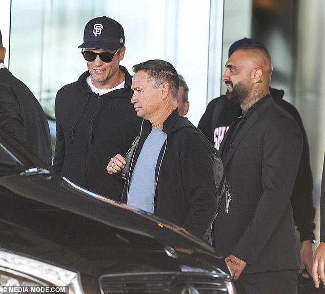 Brady arrived with a small entourage, including his trainer and security, for his trip to Australia