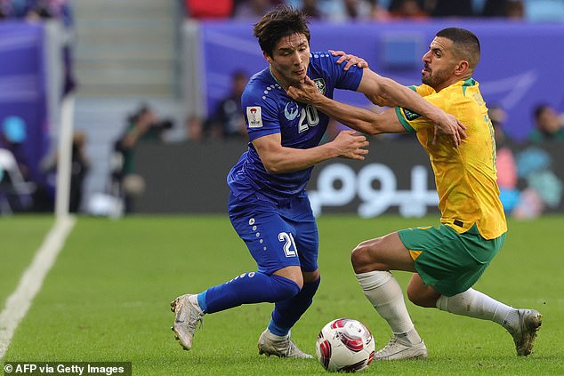 Left back Aziz Behich, pictured against Uzbekistan, is the only A-League player in the current starting Socceroos squad