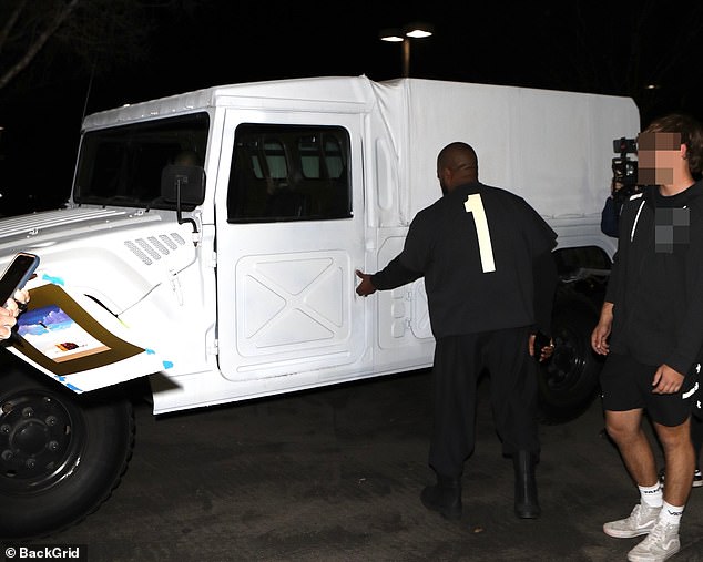 He was spotted getting into his huge all-white Toyota Mega Cruiser