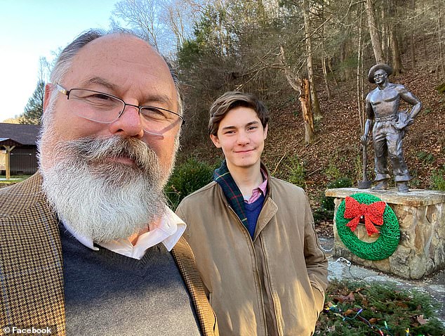 The father and pastor ran back into the fire after he managed to save his wife and two of their children.  Pictured: Mark and his son Gideon, 17