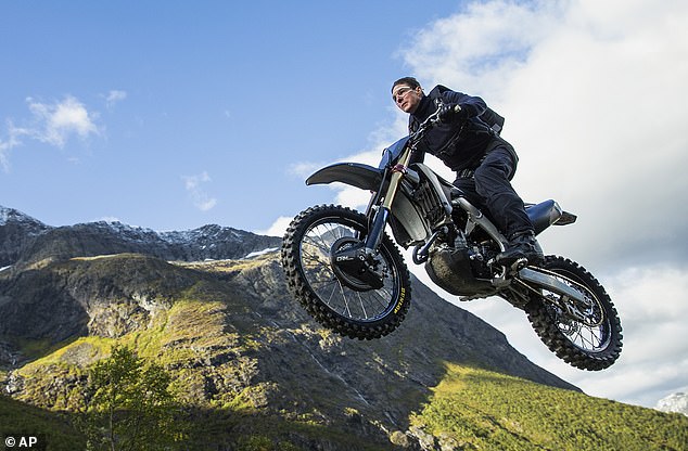 Neil described working on the Mission: Impossible franchise, starring Tom Cruise (pictured), as the 'biggest' project he worked on as he revealed how they pulled off those terrifying stunts.