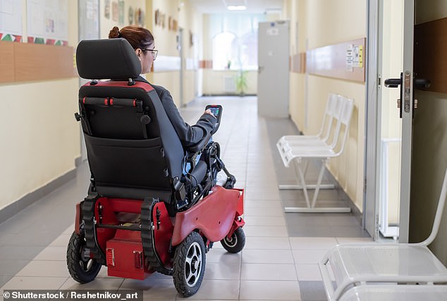 Three bodybuilders picked up an electric wheelchair to help the user off the bus (stock image)