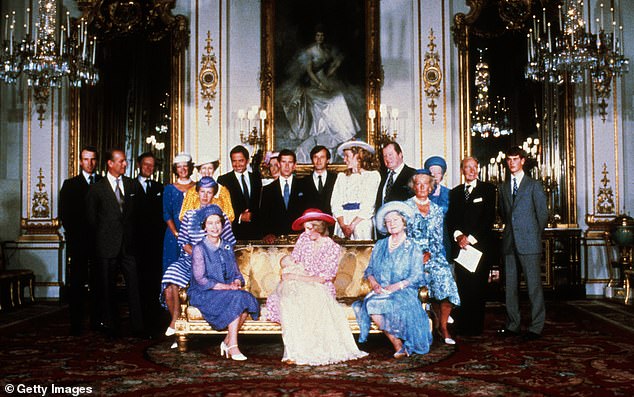 Diana, Princes of Wales, surrounded by family and friends, holds infant son Prince William as she sits with Queen Elizabeth II and Queen Elizabeth, the Queen Mother, in August 1982. Princess Anne sits on the armrest of the sofa, directly behind her mother