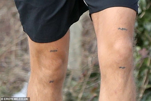 Harry's shorts showed the French and Spanish black letters he has above and below each knee: 'oui' and 'si' and 'non' and 'no'