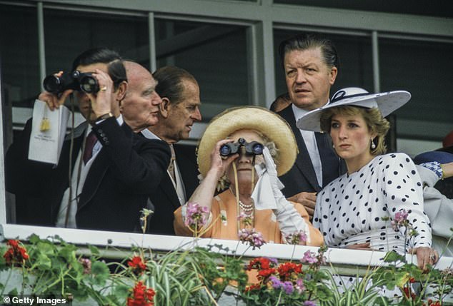 Charles and his grandmother look closely at Epsom Racecourse on Derby Day 1986. Diana in polka dots looks on