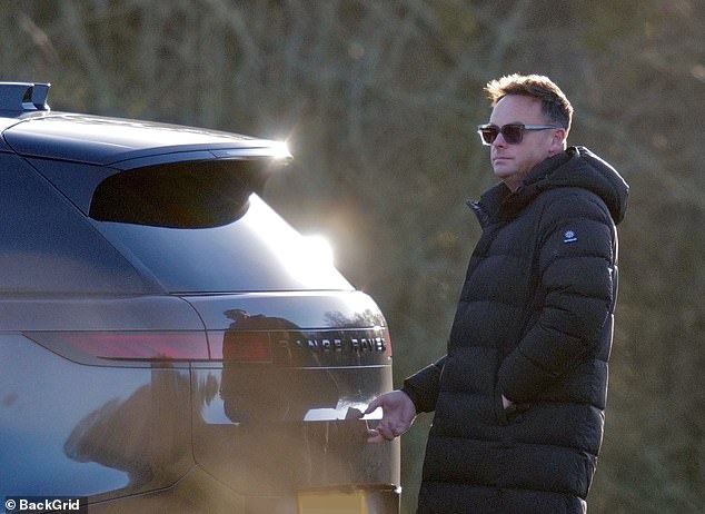 Ant returned to his Range Rover as he headed home after his walk