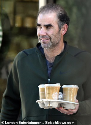 Sampras smiled for photographers as he walked away from the Starbucks restaurant