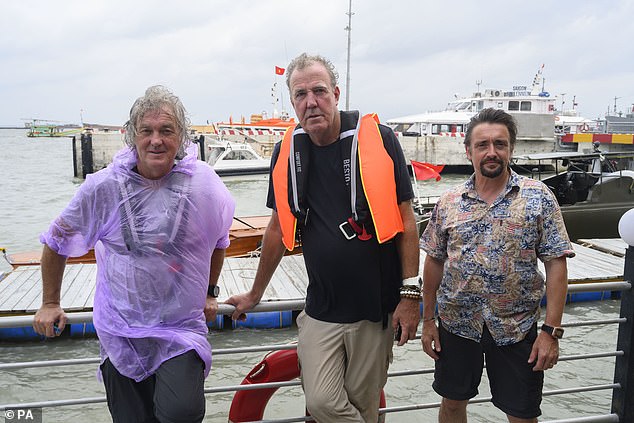 Jeremy (C) signed a major deal with the streaming service in 2015 to continue his car adventures with former Top Gear co-hosts Richard Hammond (R) and James May (L)