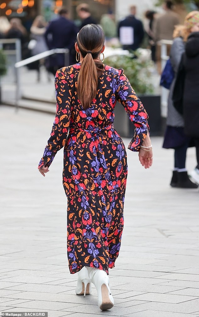 Myleene styled her brunette locks into a sleek ponytail and wore a gold heart-shaped necklace and a layer of bangles