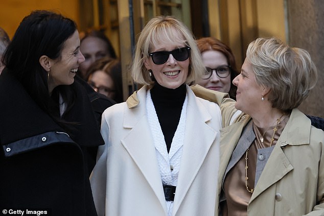 On Friday, a jury awarded Carroll (pictured center, with her legal team after their victory) more than $60 million more than she sought for Trump's scathing comments about her allegations that he stole her from a Manhattan department store in the 1990s. had raped.  Trump has insisted he never met her