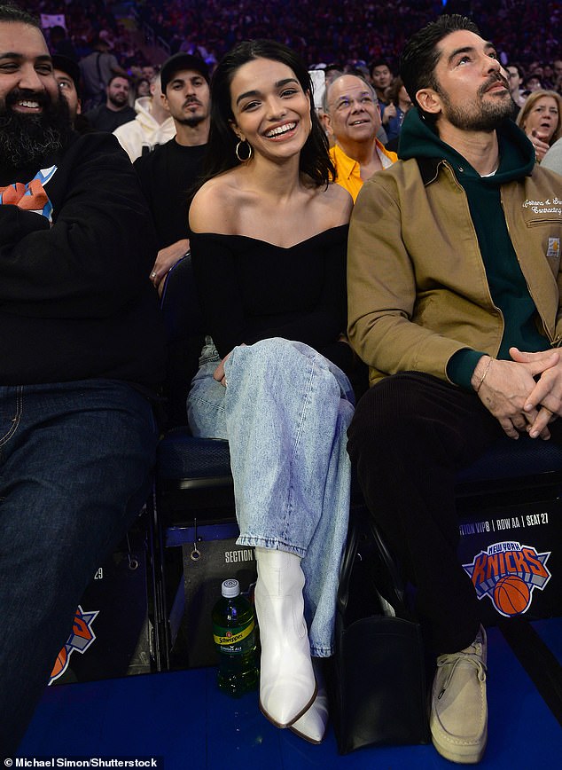 Rachel Zegler opted for a low-cut black blouse that was combined with light blue jeans