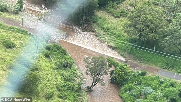 Queensland Ambulance Service paramedics were unable to reach the woman safely by road due to flooding in the Lockyer Valley region (pictured)