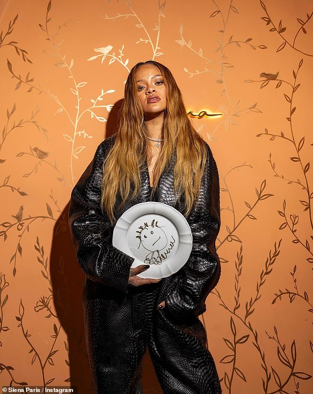 Rihanna drew her famous Instagram profile photo on a board at the same restaurant in Paris