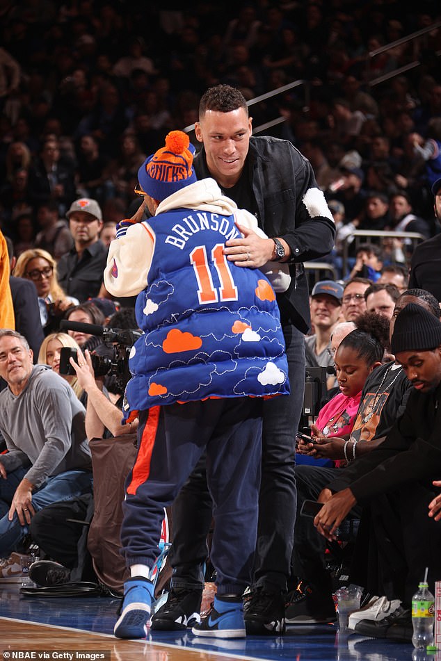 Aaron Judge greets Spike Lee during Saturday's Knicks-Heat game.  Lee is a longtime Yankees fan