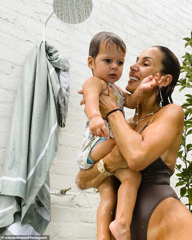 The former reality TV star carried her two-year-old underwater and smiled as she cuddled with her bundle of joy for some wholesome photos