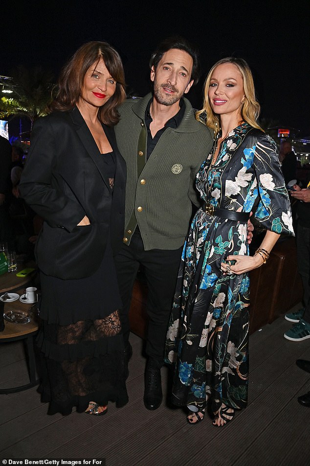 Helen posed for a photo with couple Adrien Brody and Georgina Chapman after they bumped into each other