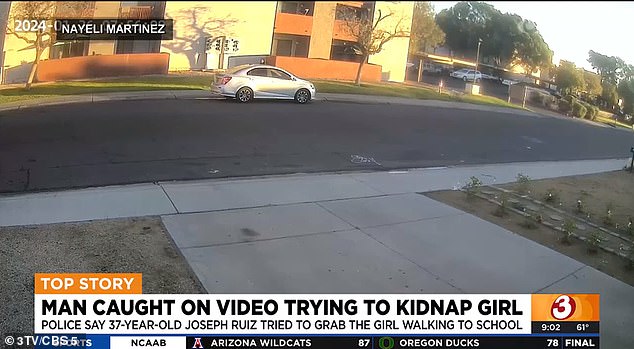 In the clip, the accused creep's silver sedan is apparently waiting for the young girl after she left her family's apartment at 43rd Avenue and Onyx Avenue.