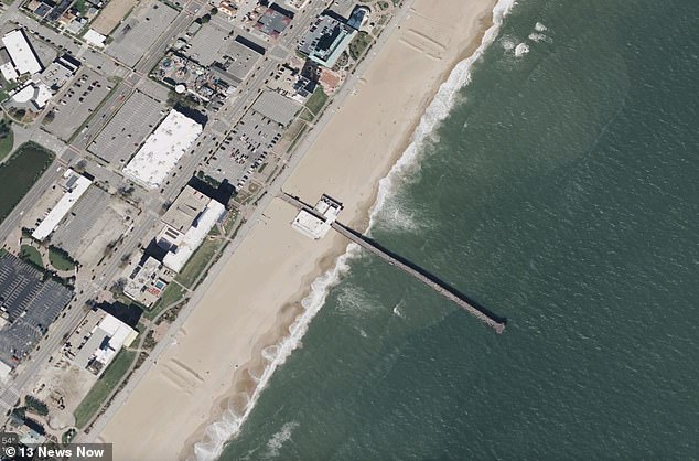 The pier is 200 meters long and the water at the end is about 4.5 meters deep.  The water temperature is in the mid 40s