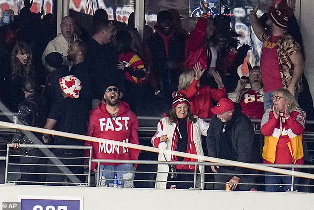 Swift (left) and Donna Kelce (right) celebrate while Jason Kelce (above right) gives a high-five