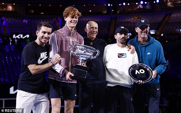 The pair were also presented with a silver plaque with the words 'Australian Open Champion Coach Men's Singles 2024' (pictured, right) - but astonished fans said they had never seen such a presentation at a grand slam