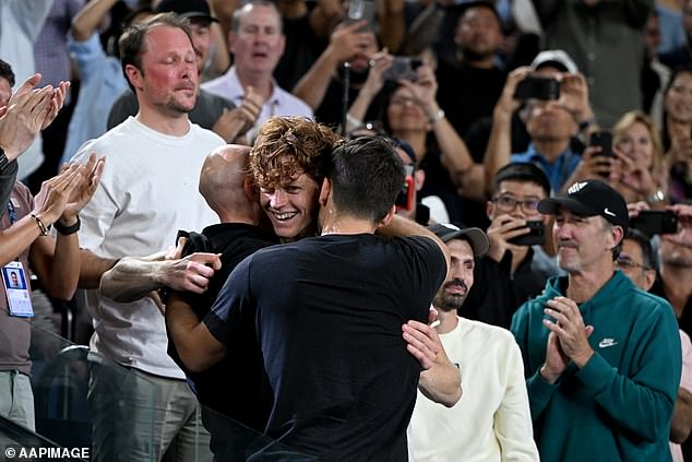 The 22-year-old caused joyful scenes as he climbed into his player's box to celebrate with his team after beating Daniil Medvedev on Sunday night (pictured)