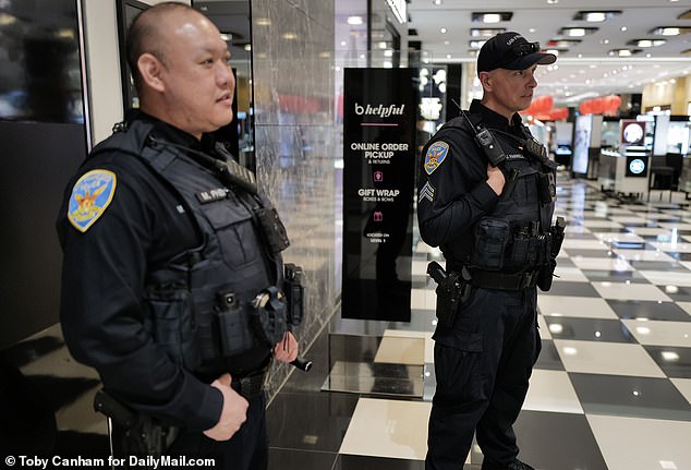 Outside the entrance to Bloomingdale's, which is now the mall's largest tenant after Nordstrom's exit, two police officers stand guard on a quiet Friday afternoon in mid-January.