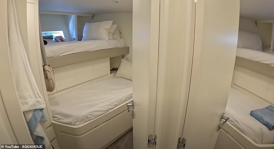 There are two staff cabins with staggered beds and en suite shower rooms, while the captain's cabin has a single bed and a shower in the bathroom with glass doors