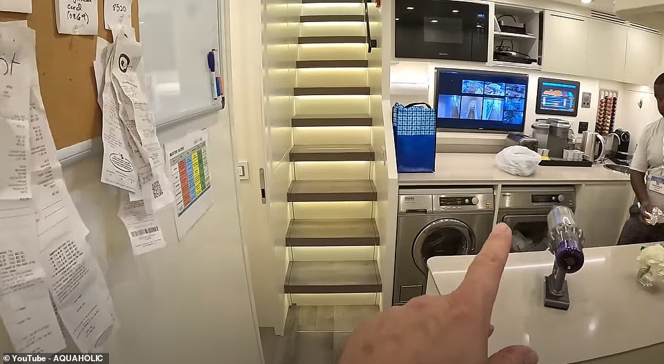 Nick moves the camera around to show the crew's dining area and main washing facilities