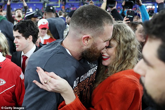 Travis Kelce kisses girlfriend Taylor after leading his Chiefs team to a spot in the Super Bowl