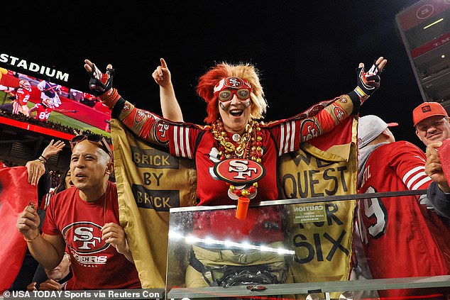 A San Francisco fan enjoys the team's success during its win over the Detroit Lions