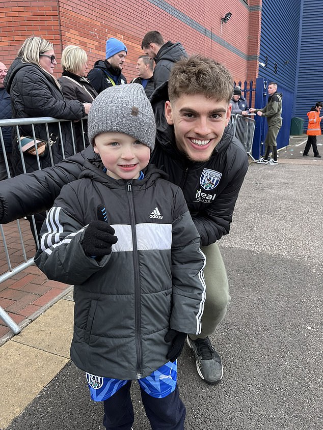 Dunn's son took photos with the West Brom players after the match