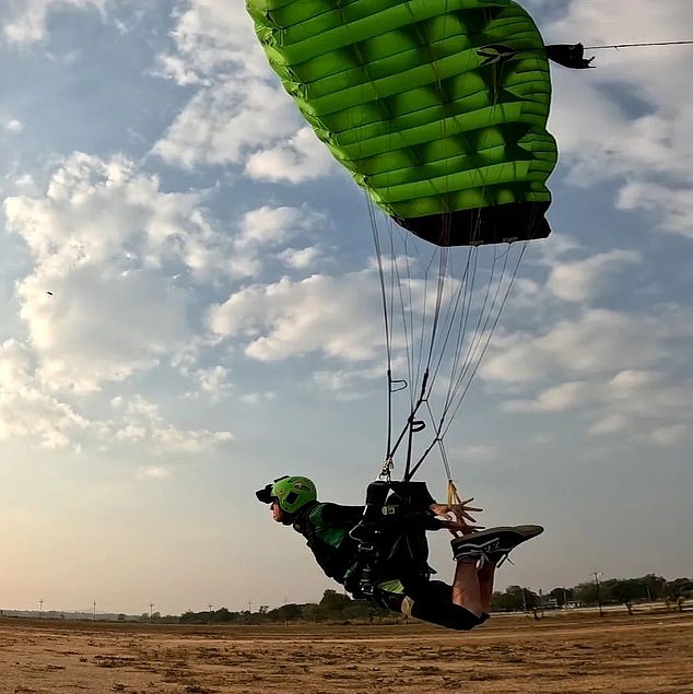 In a latest image posted to the tattooed daredevil's Instagram yesterday, Mr Odinson can be seen leaning forward with his arms pointing back as he soars through the air in a green helmet