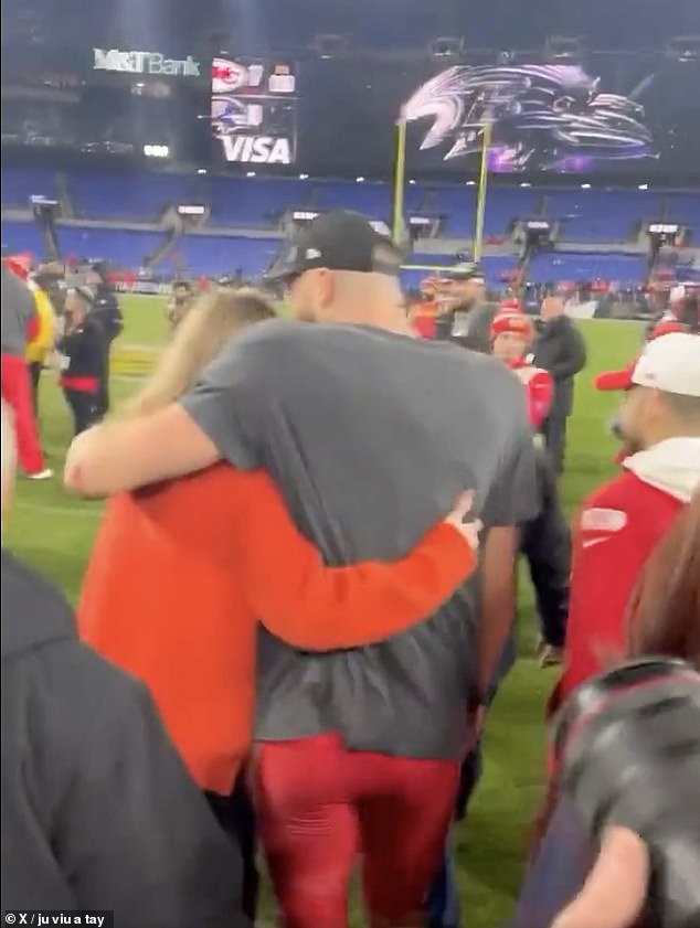 The Kansas City Chiefs tight end was spotted walking across the field with girlfriend Taylor Swift after their win last night