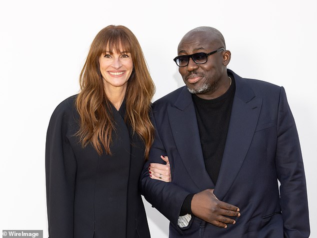 Julia proved she fit right in with the fashionistas and caused a storm with Vogue editor Edward Enninful, looking stylish in a suit