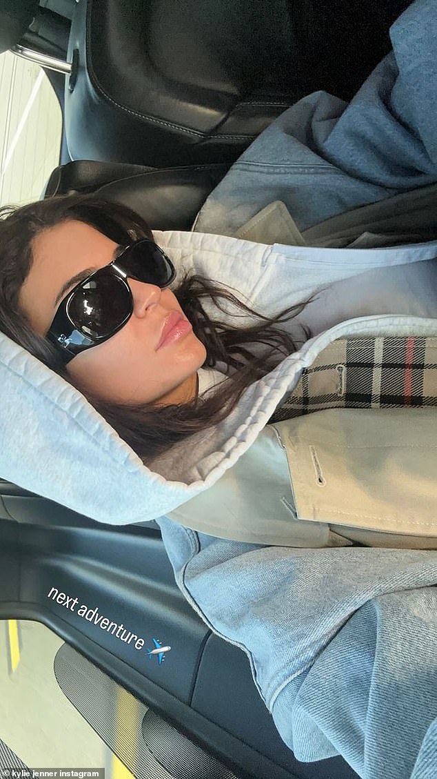 She used the social media app's Stories feature to upload a selfie in which she wore large black sunglasses and a trench coat.  The hood of her outerwear was pulled over her head as she sat in a car with a black leather interior