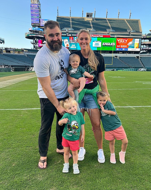 Kelce pictured with wife Kylie and their three daughters Wyatt, Elliotte and Bennett