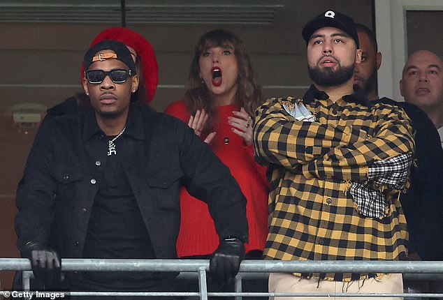 The global superstar watches during the second quarter of the AFC Championship Game