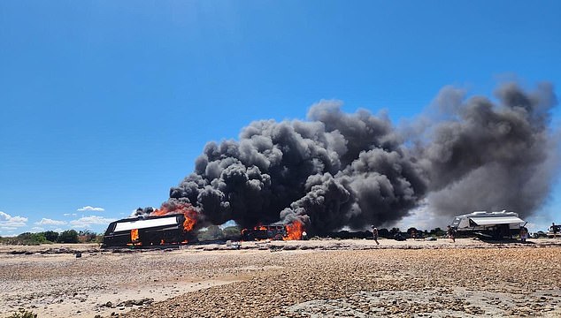 The family could only watch as the 4WD, caravan and belongings went up in smoke