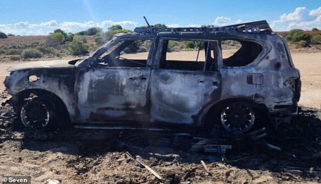 The car and the hope of continuing their adventure are now in ruins.  In the photo: the burned-out Nissan Patrol