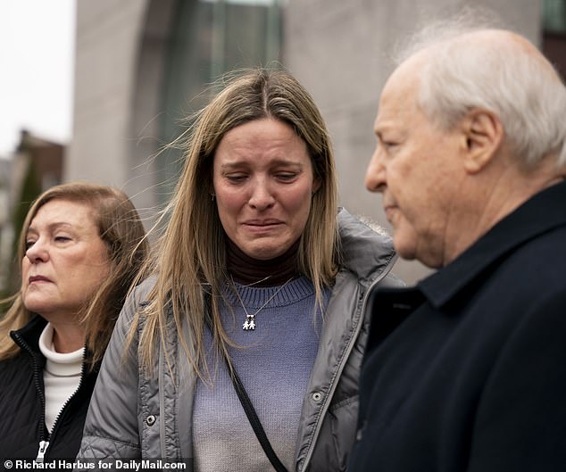 Troconis' sister Claudia (center, flanked by her parents Marisela and Carlos) cried outside the court