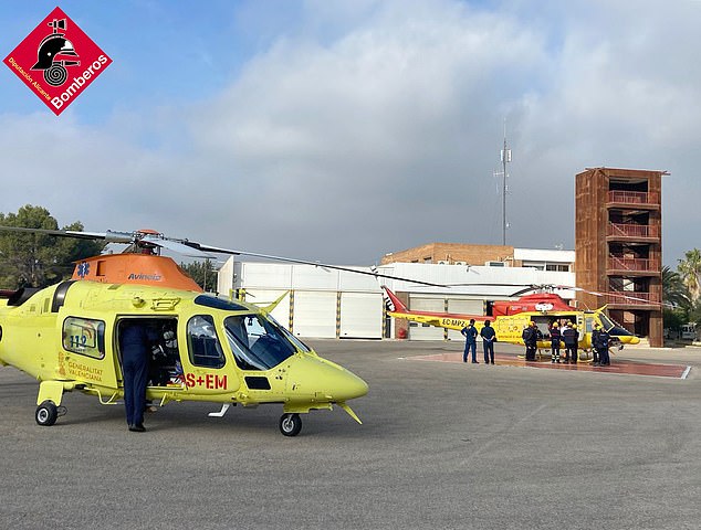 The team in the air ambulance as the man is taken for treatment after the accident near Murla village