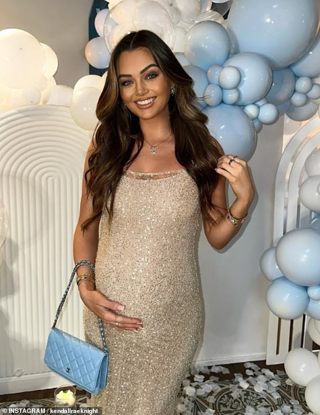 The former Love Island star, 32, who is expecting her first child with footballer boyfriend Andrew Hughes, looked cheerful as she cradled her baby bump